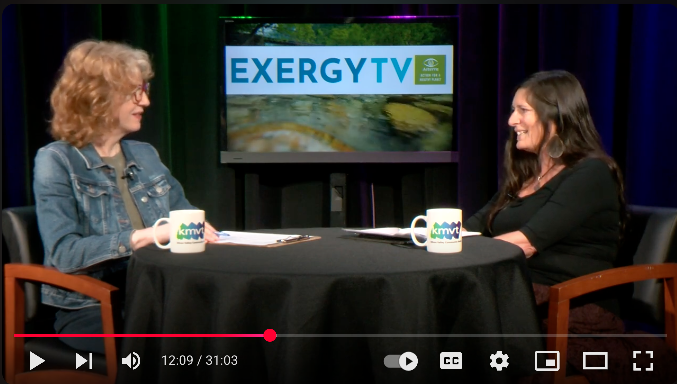 Two people sitting at a table for an interview
