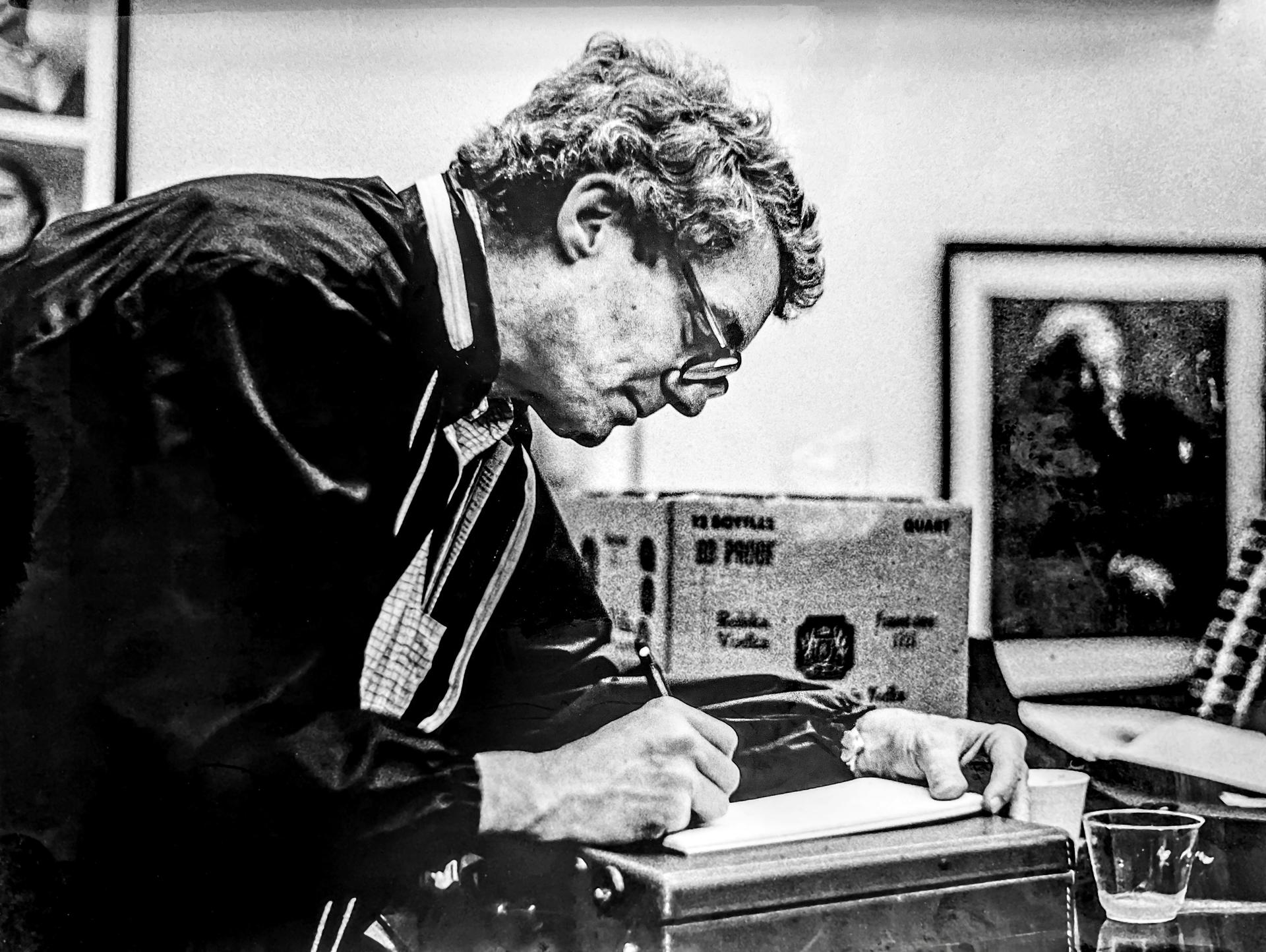 Former Littoral Society Executive Director Dery Bennett writes at his desk