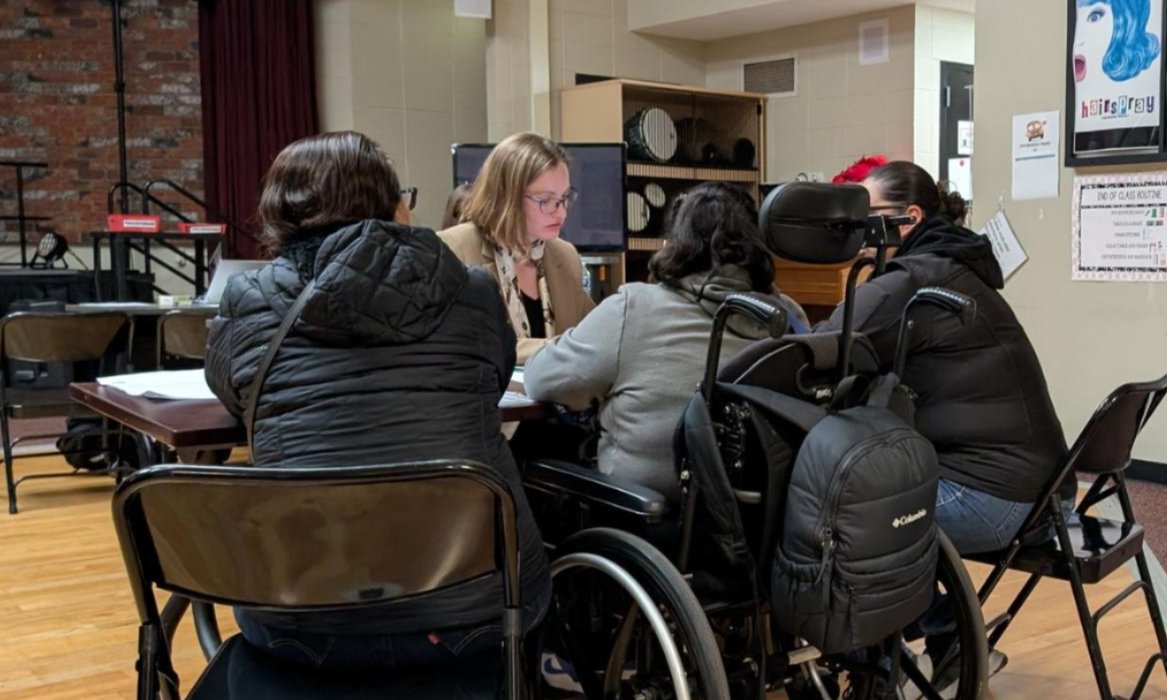 CDEL volunteer attorney working with clients at CDEL’s 10/27 Guardianship Workshop