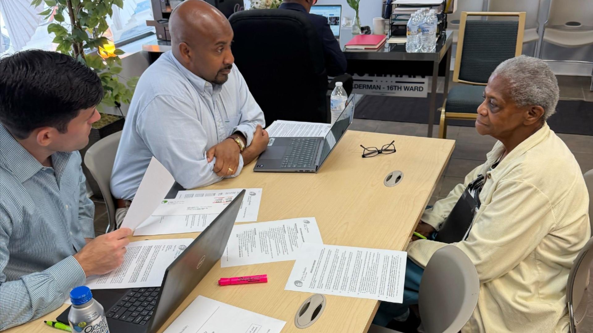 CDEL client with Federal Signal volunteers at our TODI Workshop at the 16th Ward Alderperson's Office