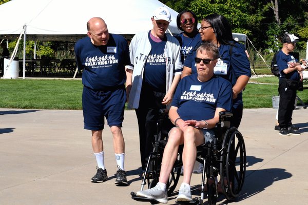 Staff and Residents walking at Walk Ride Run