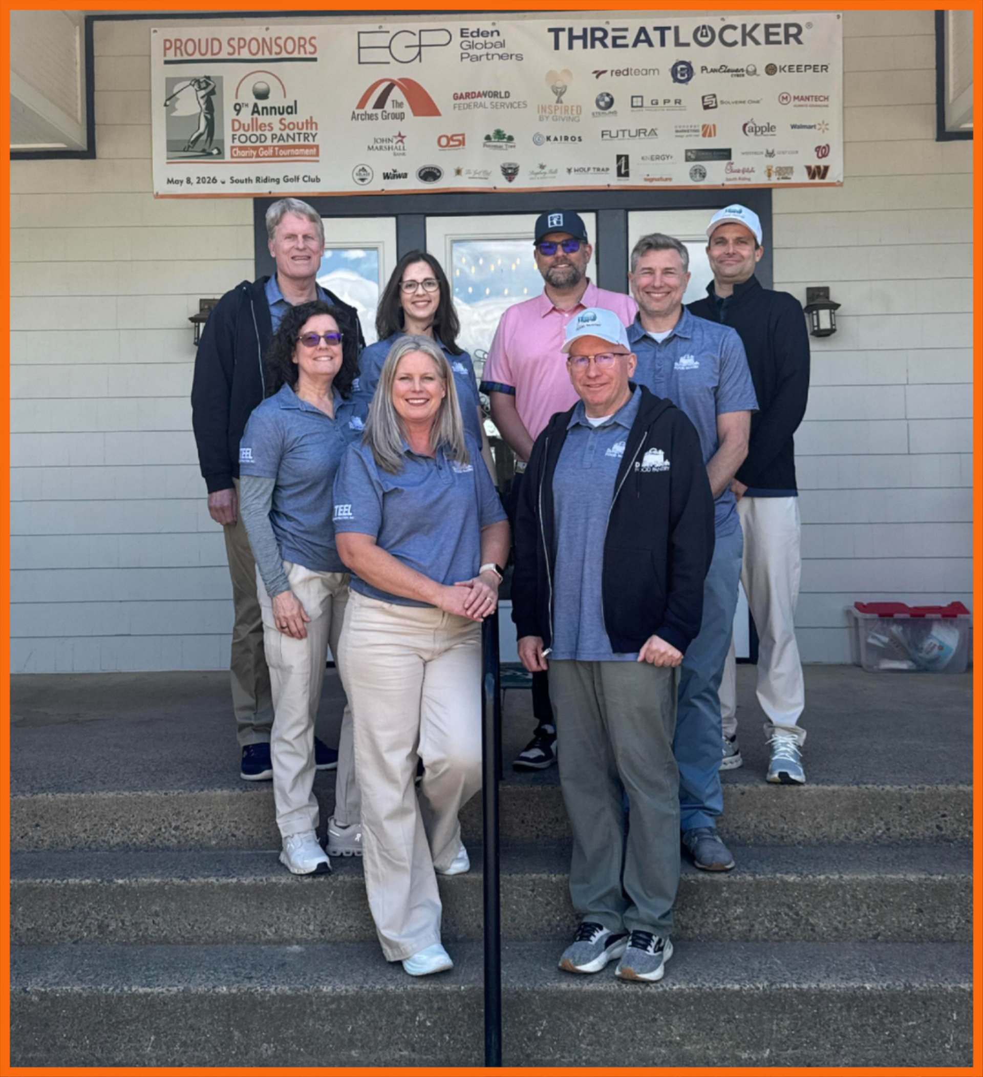 Members of the DSFP Golf Tournament Committee standing on steps beneath the tournament banner with sponsor names