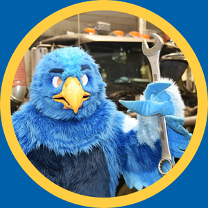 Representative Wendy Horman of the Idaho State Legislature stands at a podium in front of the partially constructed Future Tech Building. A large banner on the building reads “Battelle Energy Alliance (BEA) Future Tech Building in partnership with Frontier Credit Union.”