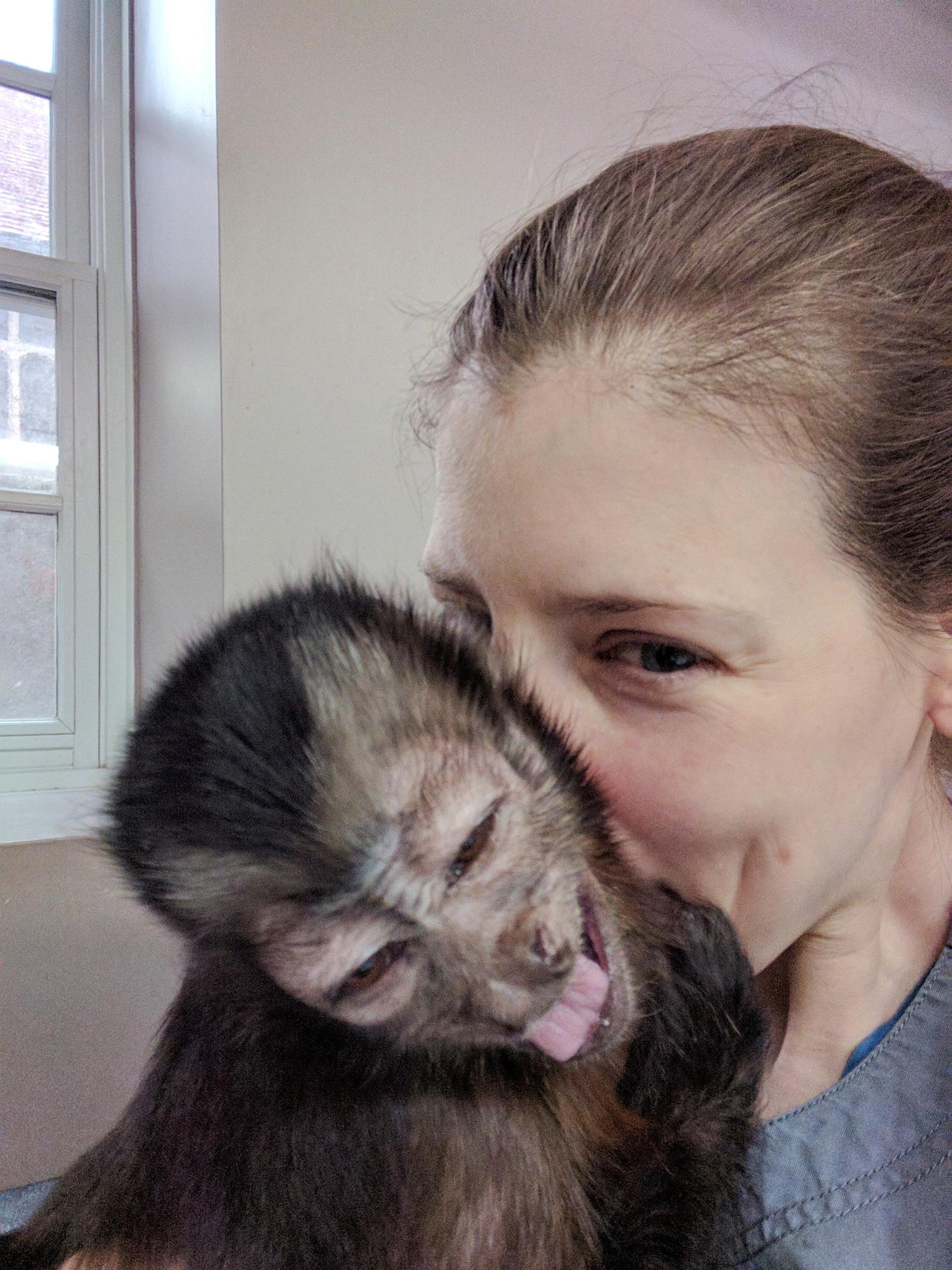 Alison Payne and a capuchin monkey