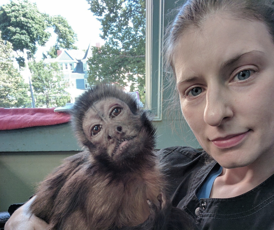 Alison Payne and a capuchin monkey