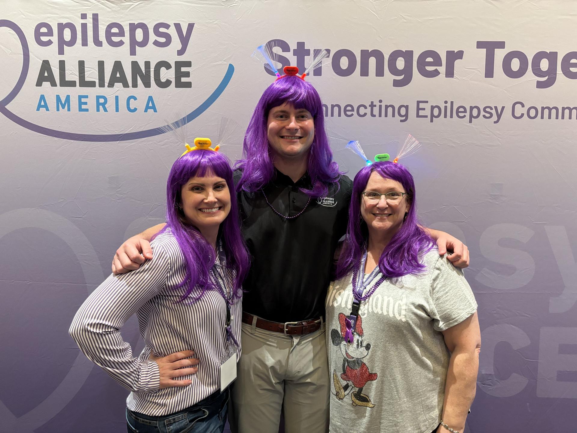 EAA board members having fun wiht purple wigs