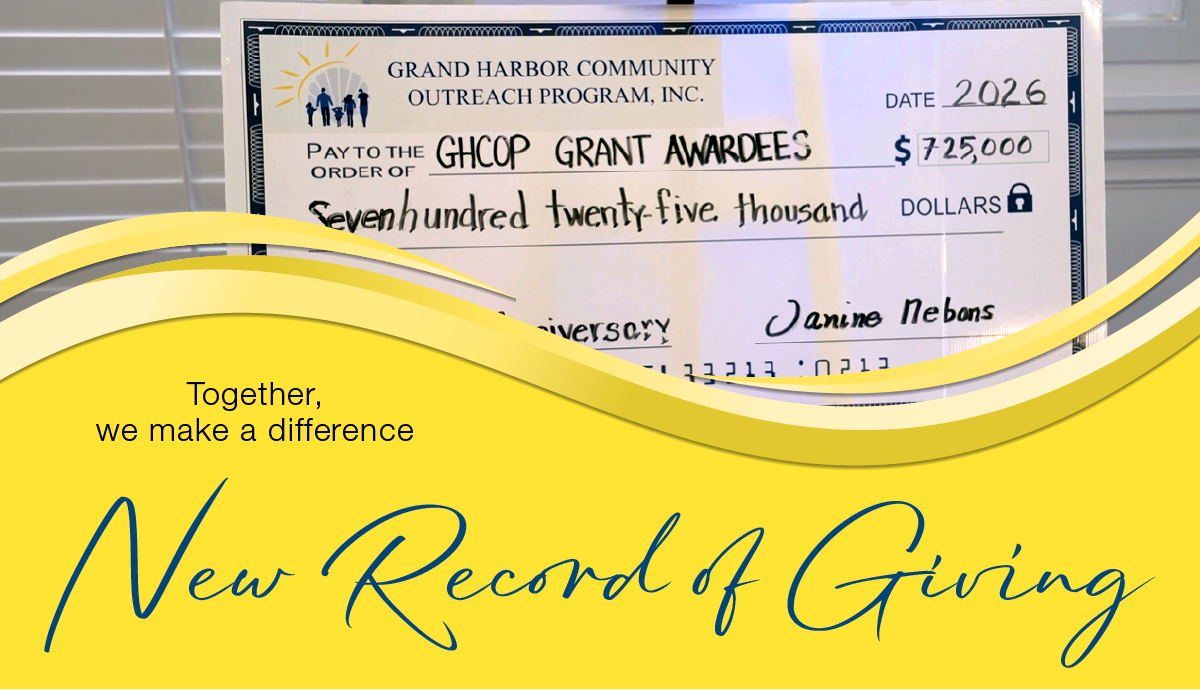 large check made out to GHCOP Grant Awardees for $725,000 with the caption: ogether, we make a difference: new record of giving