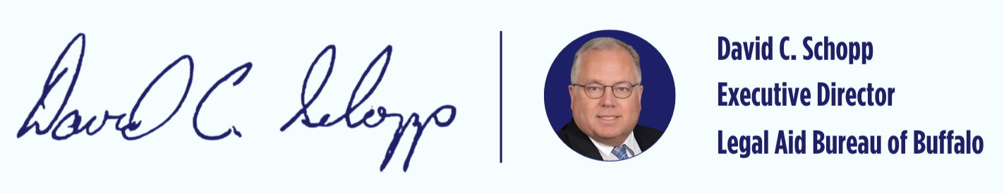 Signature block with David C. Schopp's photo