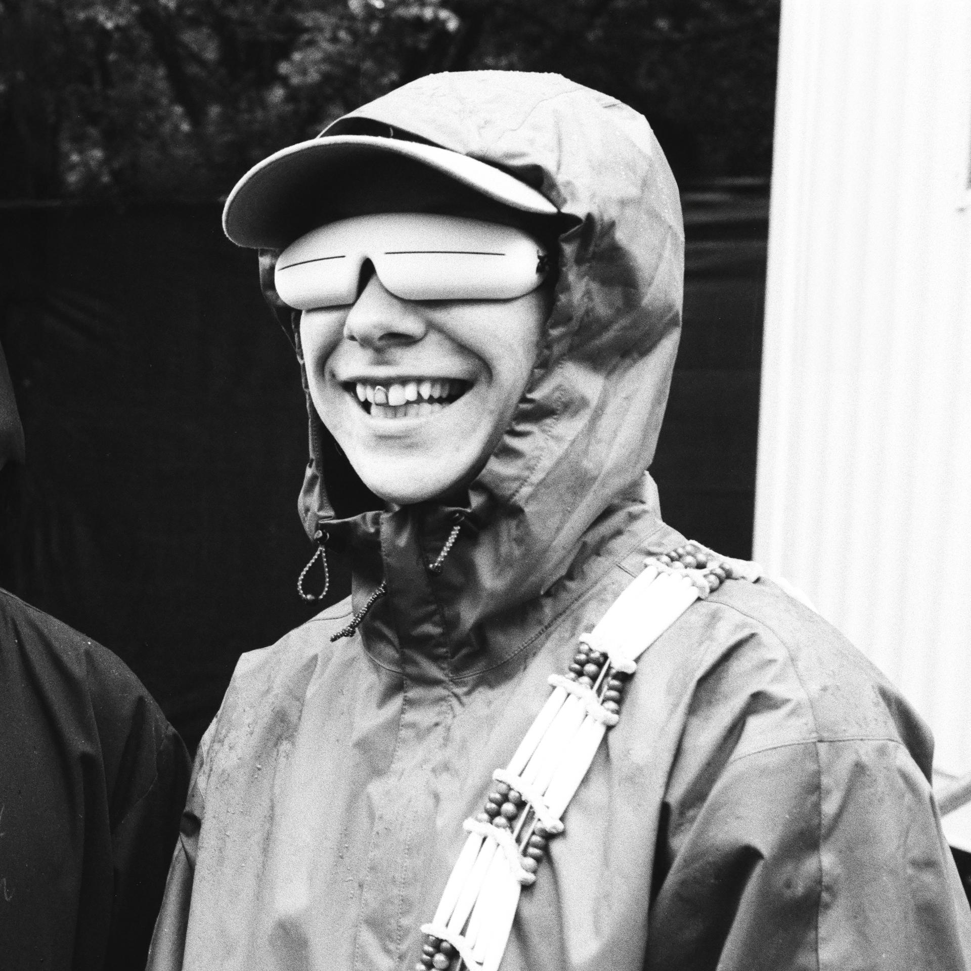 Black and white image of Quinn Christopherson wearing snow goggles.