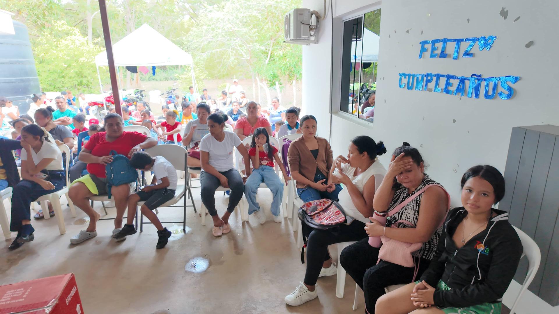 families waiting educational talk