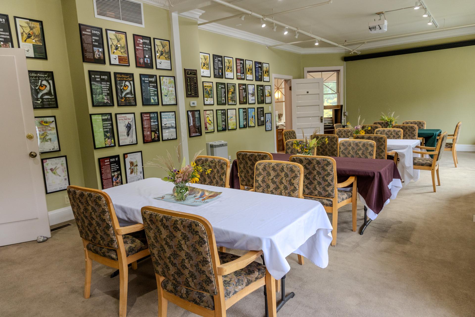 A picture of WRI's River Haus Bird Fest room with tables and chairs arranged.