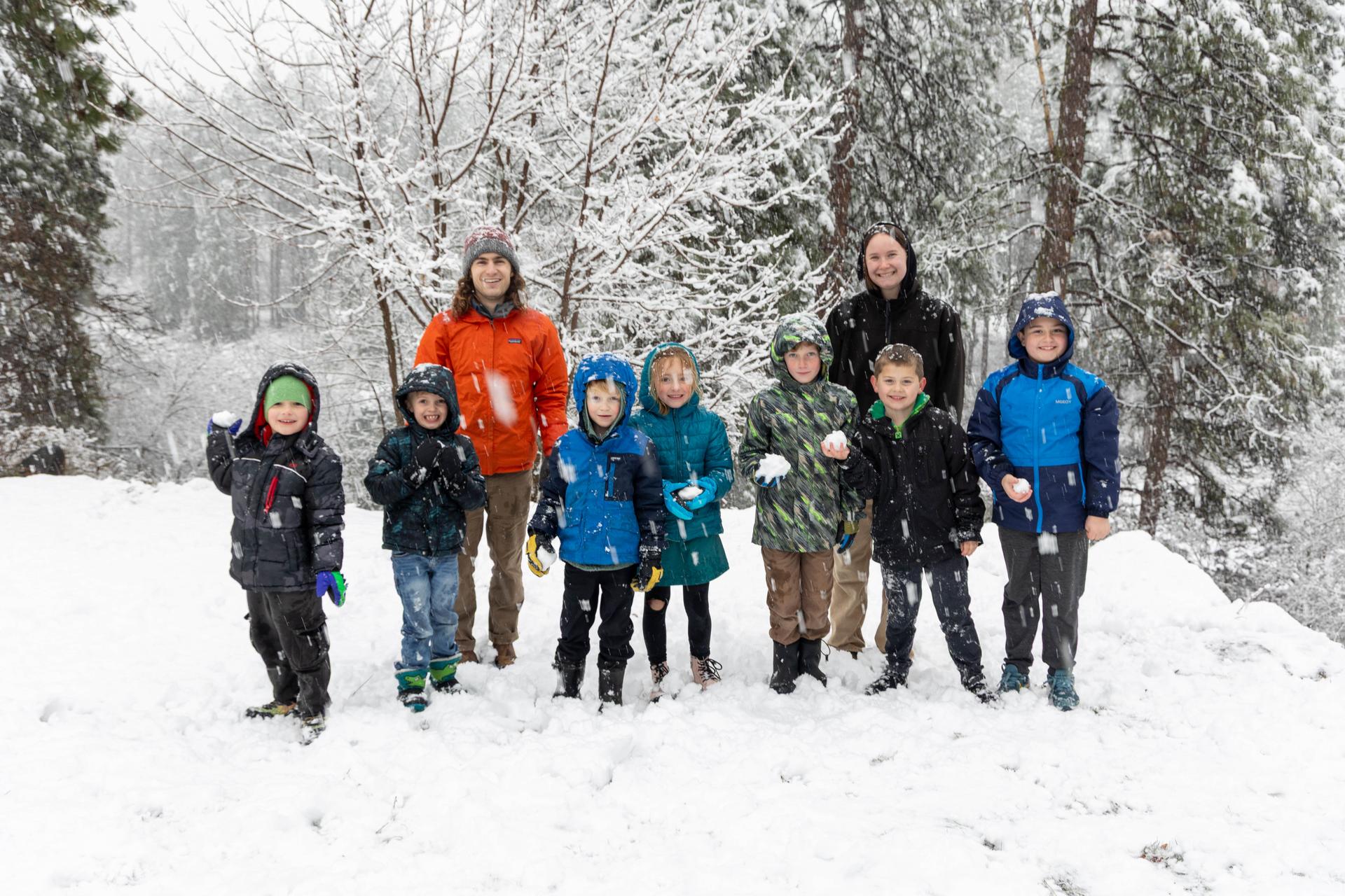 2026 Winter WRI After School Program kids group photo armed with snowballs.