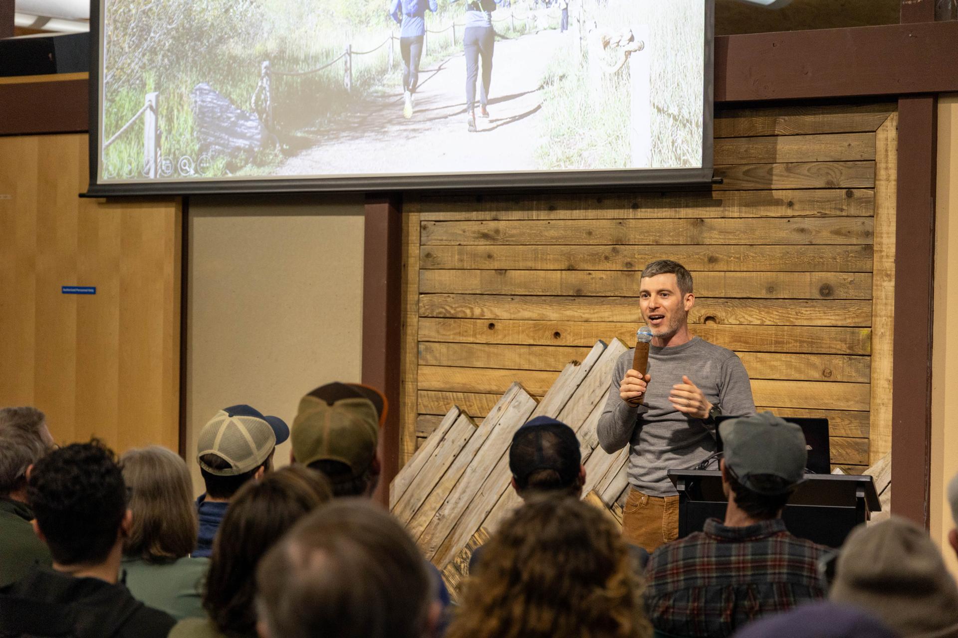 Image of Gregory Scruggs presenting on the Enchantments Red Barn Event.