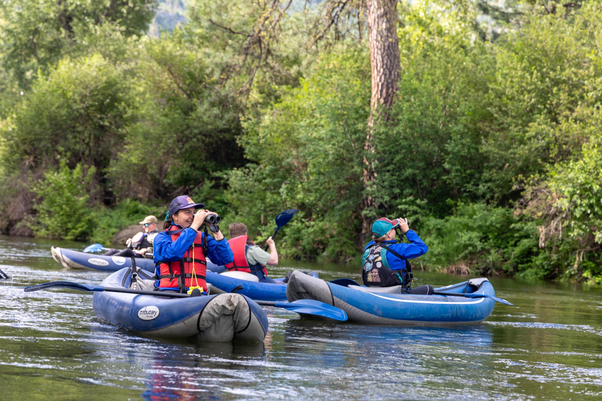 A picture of Bird Fest participants on a kayaking birding trip on the Icicle River with LOC.