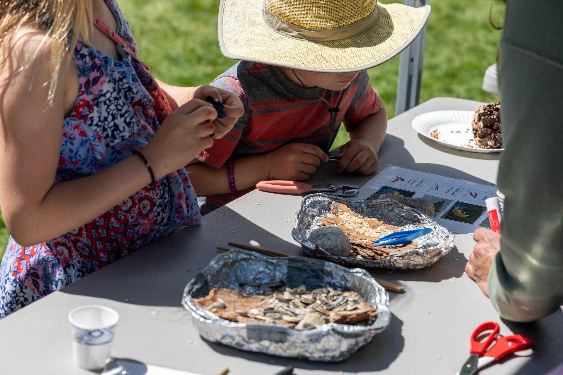 Kids at an activity table at Bird Fest 2026.