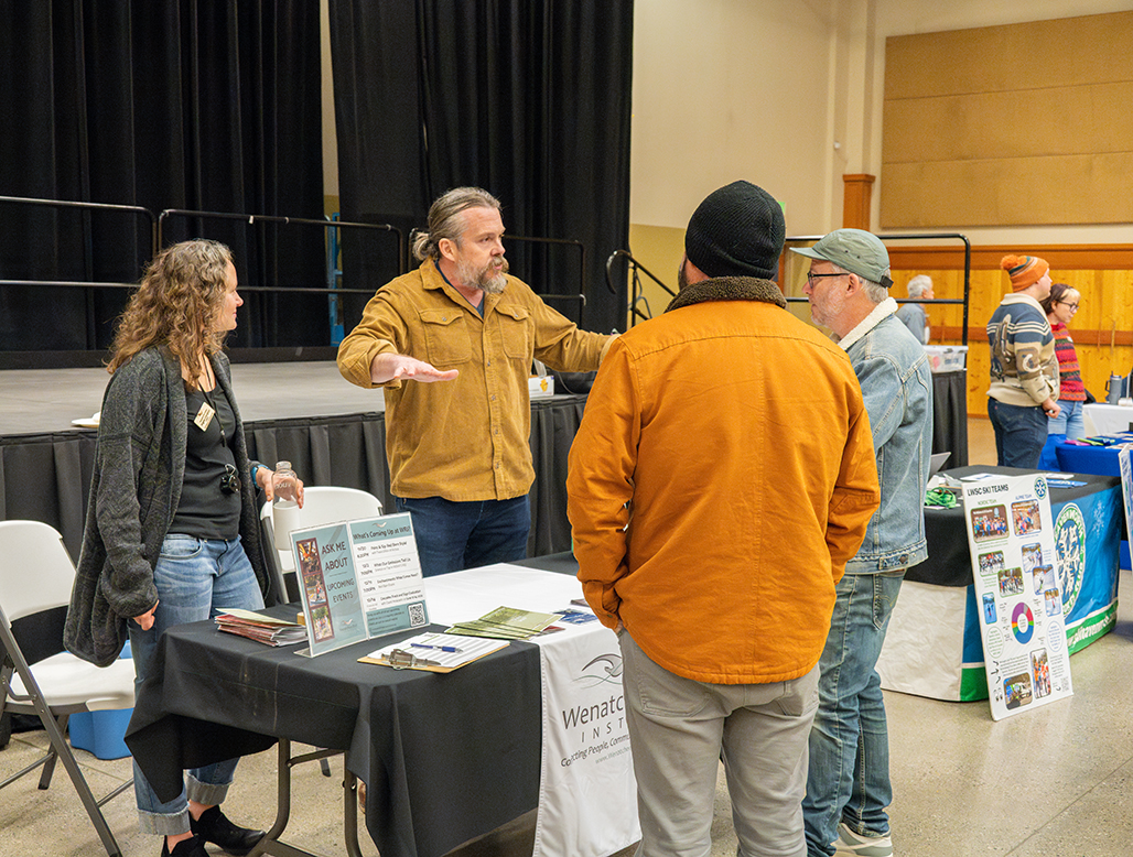 Image of people talking at the Leavenworth's Community Engagement Night on November 18th.