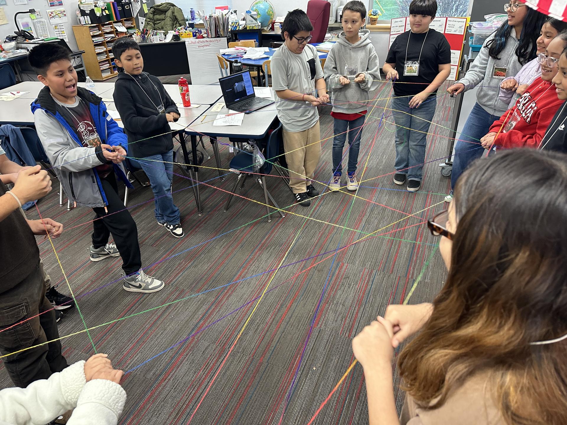 Students doing a Traveling Naturalist in the Classroom activity from 2025-2026 programming.