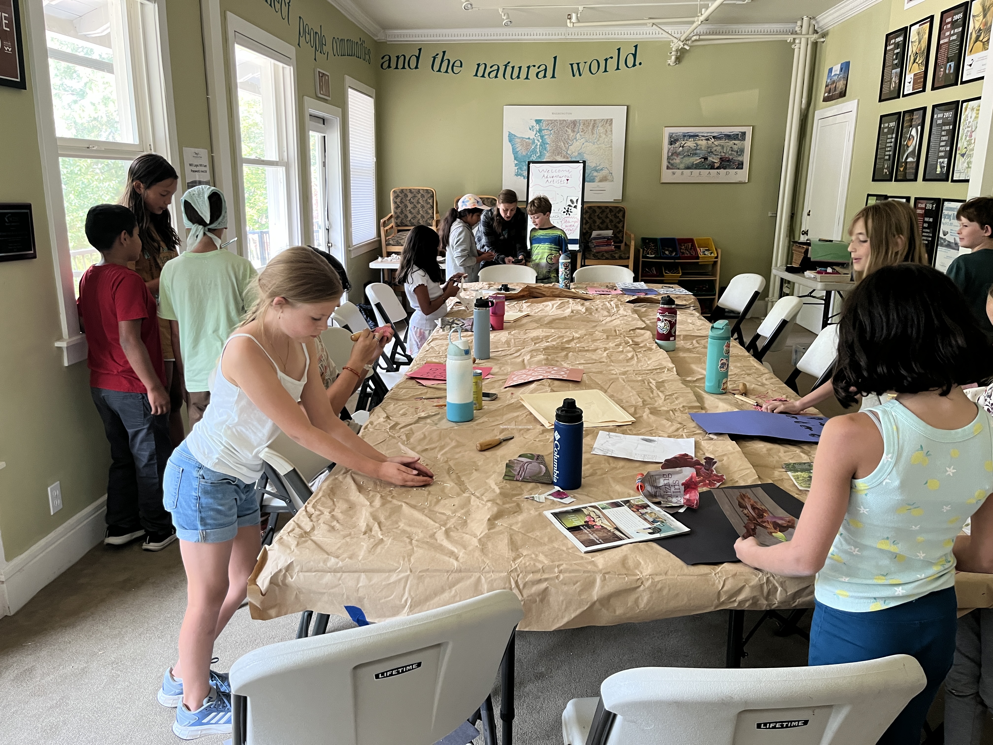 Adventurous Artists in the Bird Fest room making art during their Summer Camp at WRI.