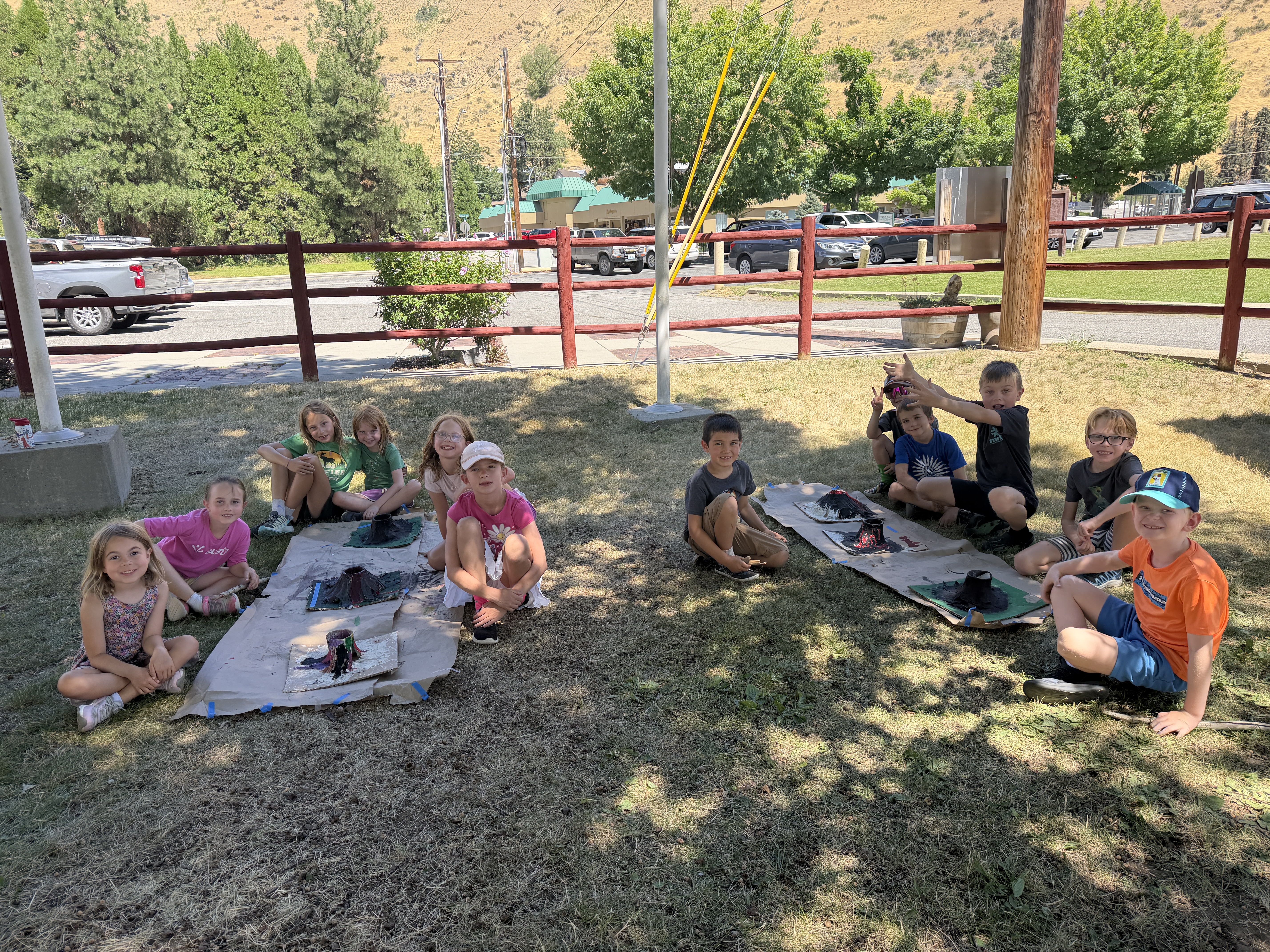 WRI/Cashmere Museum summer campers sitting in 2 groups ready to do an activity.