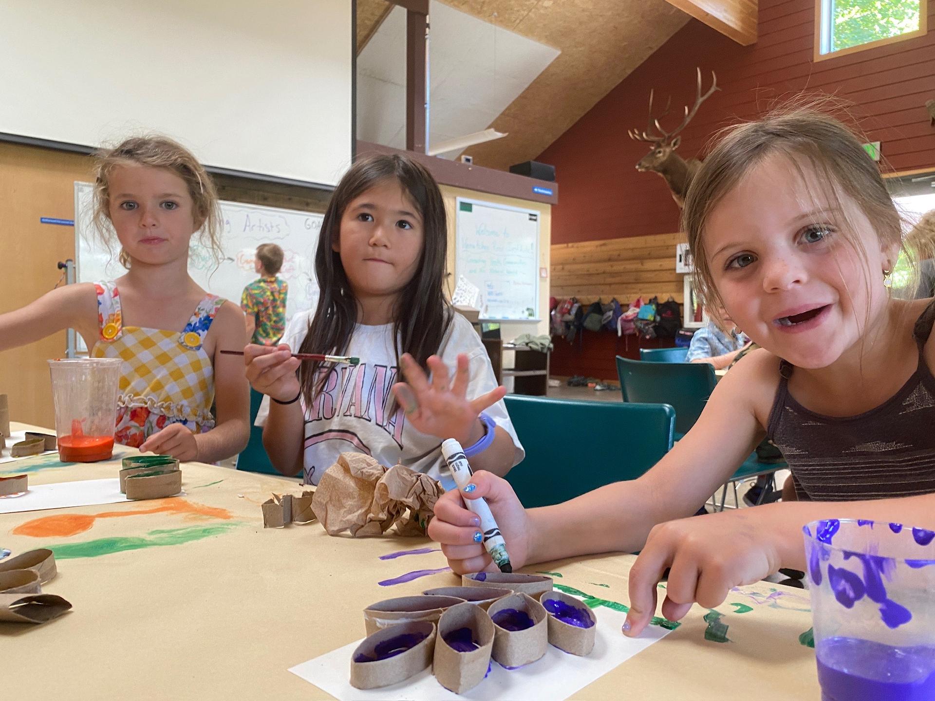 Amazing Artists Camp (grades 1-3) campers making flower art during cmap.