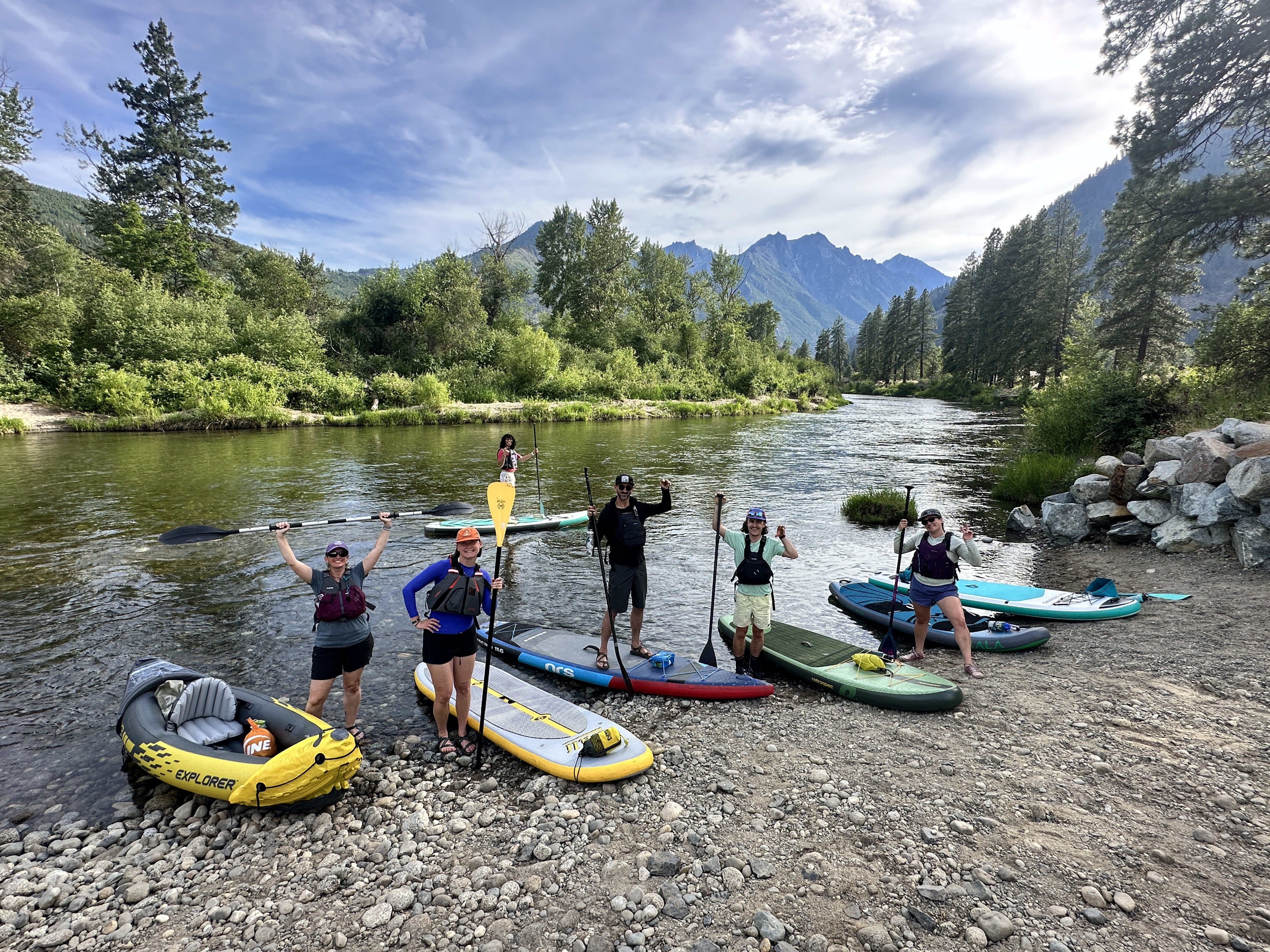 WRI Staff (and friends) on paddle crafts along the Wenatchee River doing recon for the summer river programs.