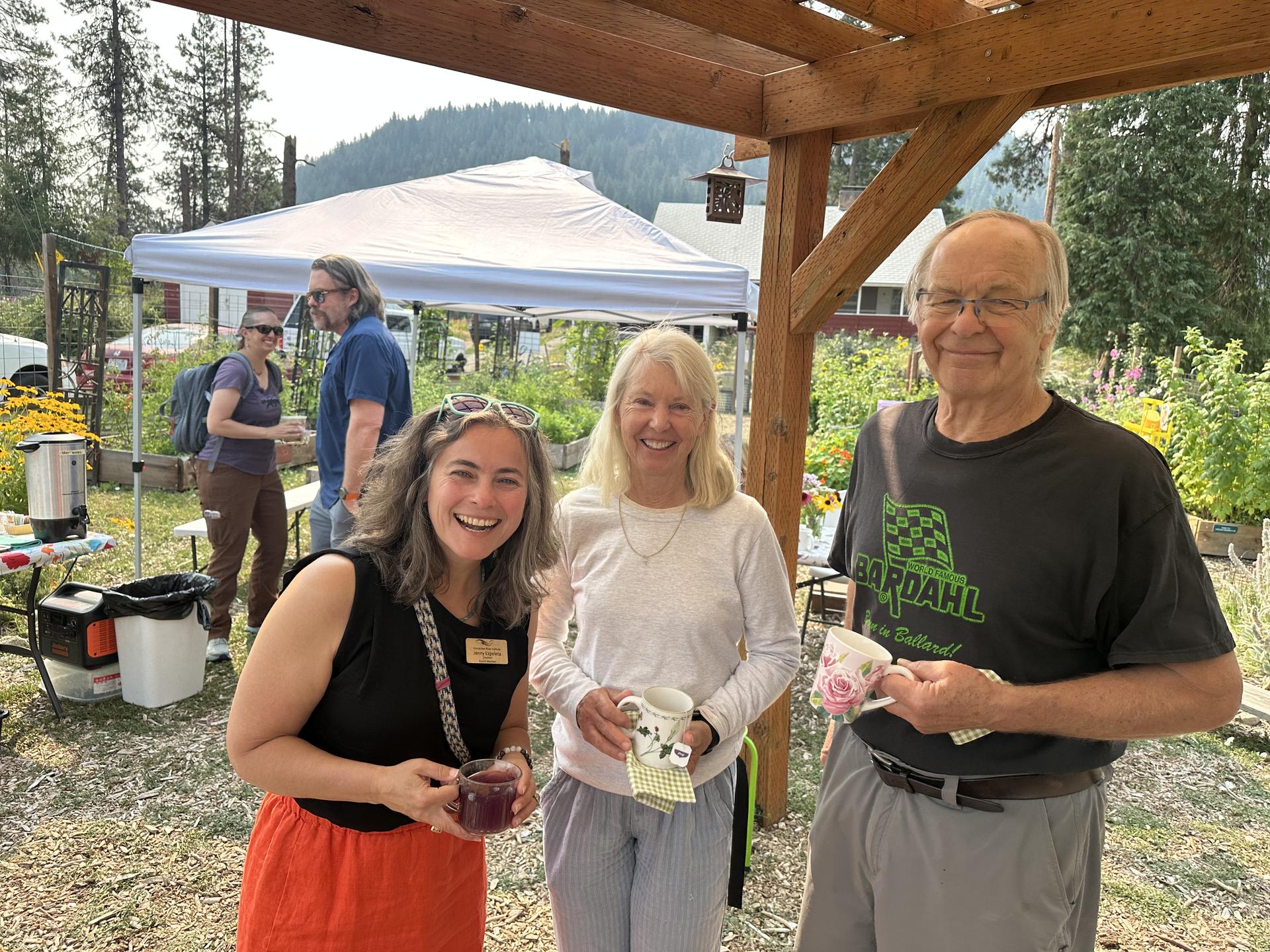 Communi-Tea in the Garden event hosted by WRI staff. Picture of our community enjoying tea in the Community Garden.
