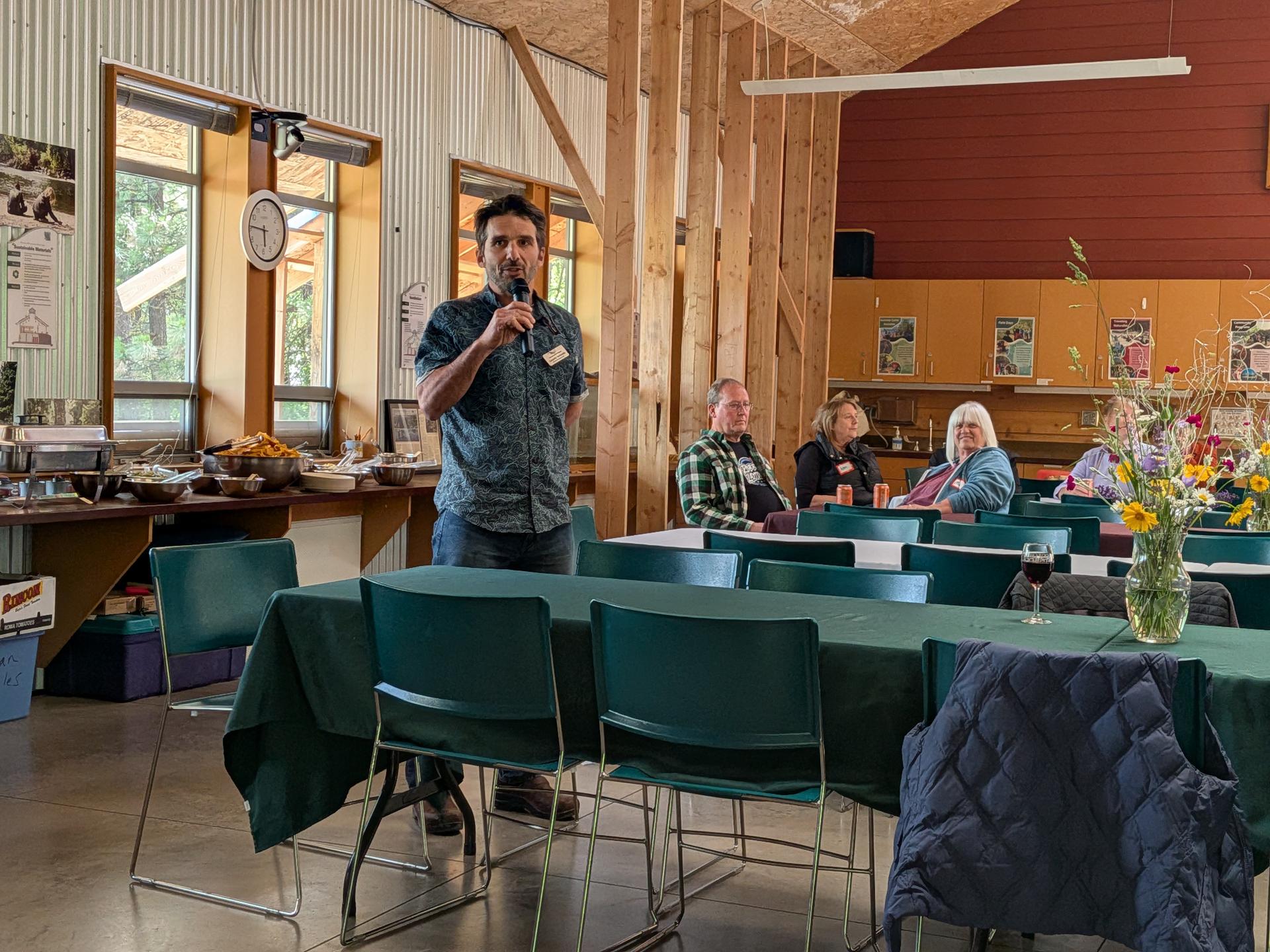 Canuche sharing a welcome at the Volunteer Appreciation dinner.