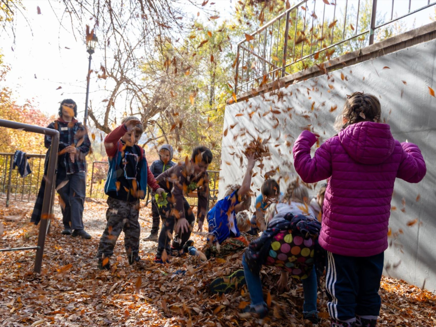 A picture of two boys testing water of the Wenatchee River.