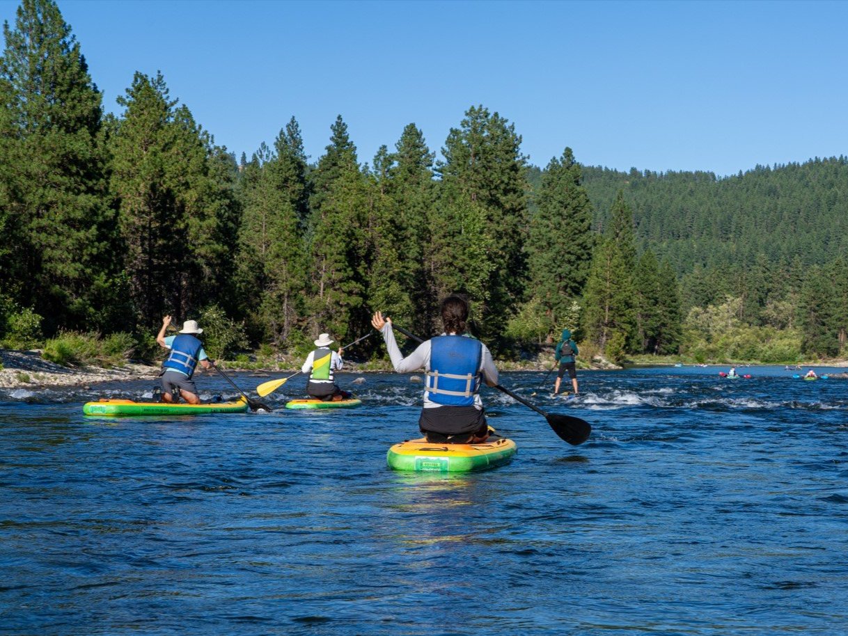 A photo of a tracking and sign course where the instructor is teaching the participants to observe.