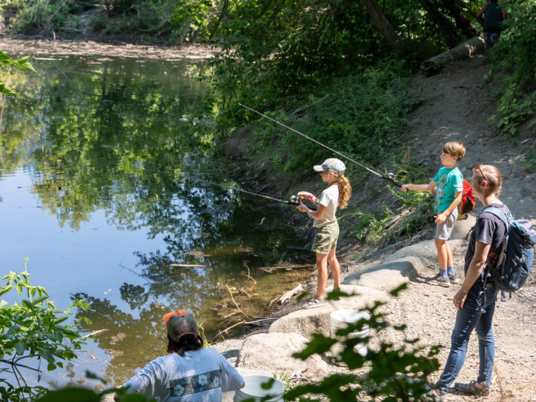 WRI Kids in the Wild campers fishing at Blackbird Island Pond