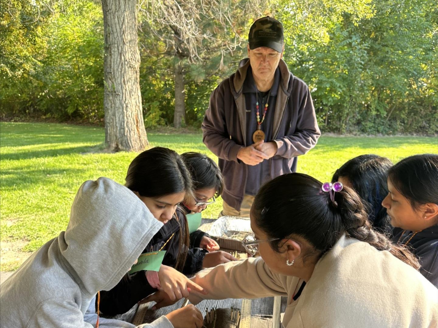 Volunteer supervising a Field Day lesson.